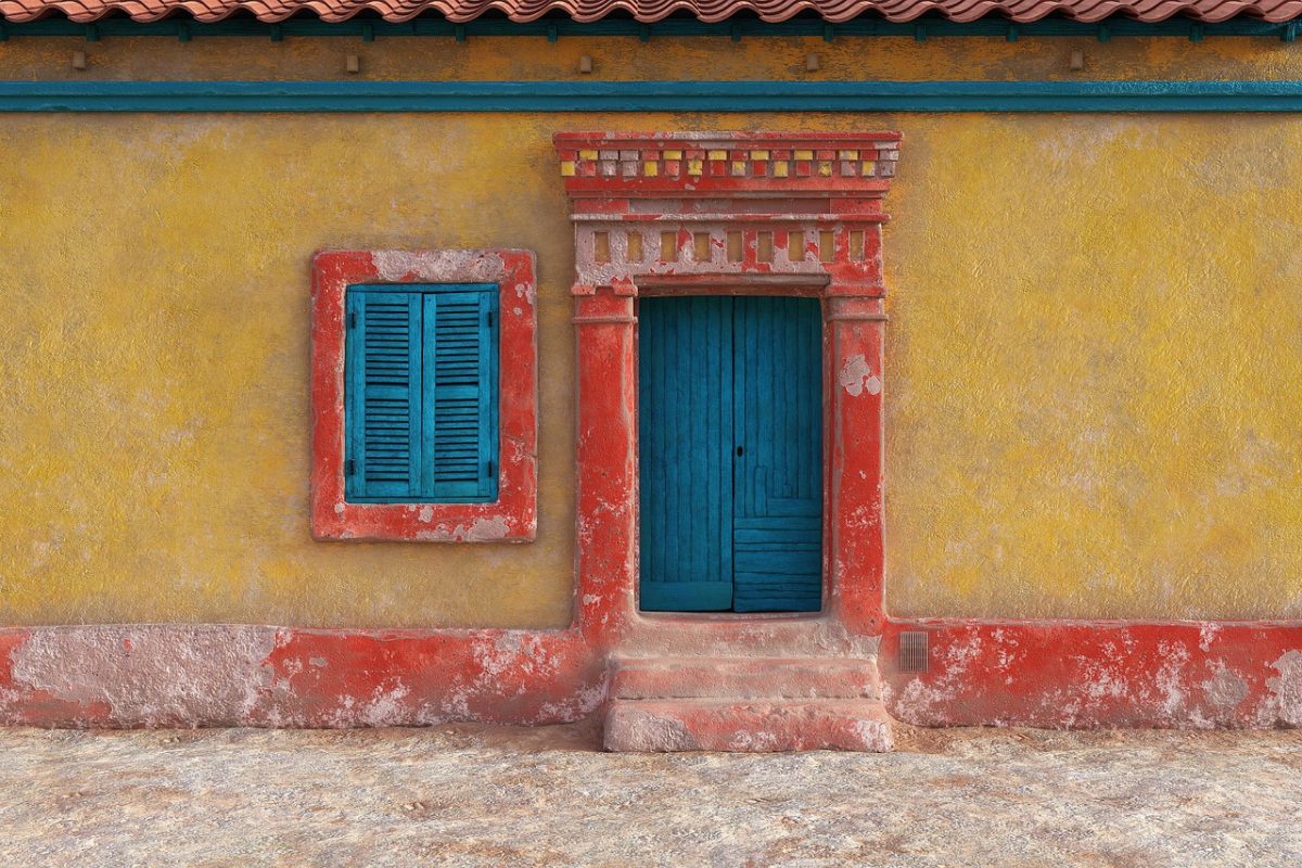 A house front door reached by a short flight of stone steps
