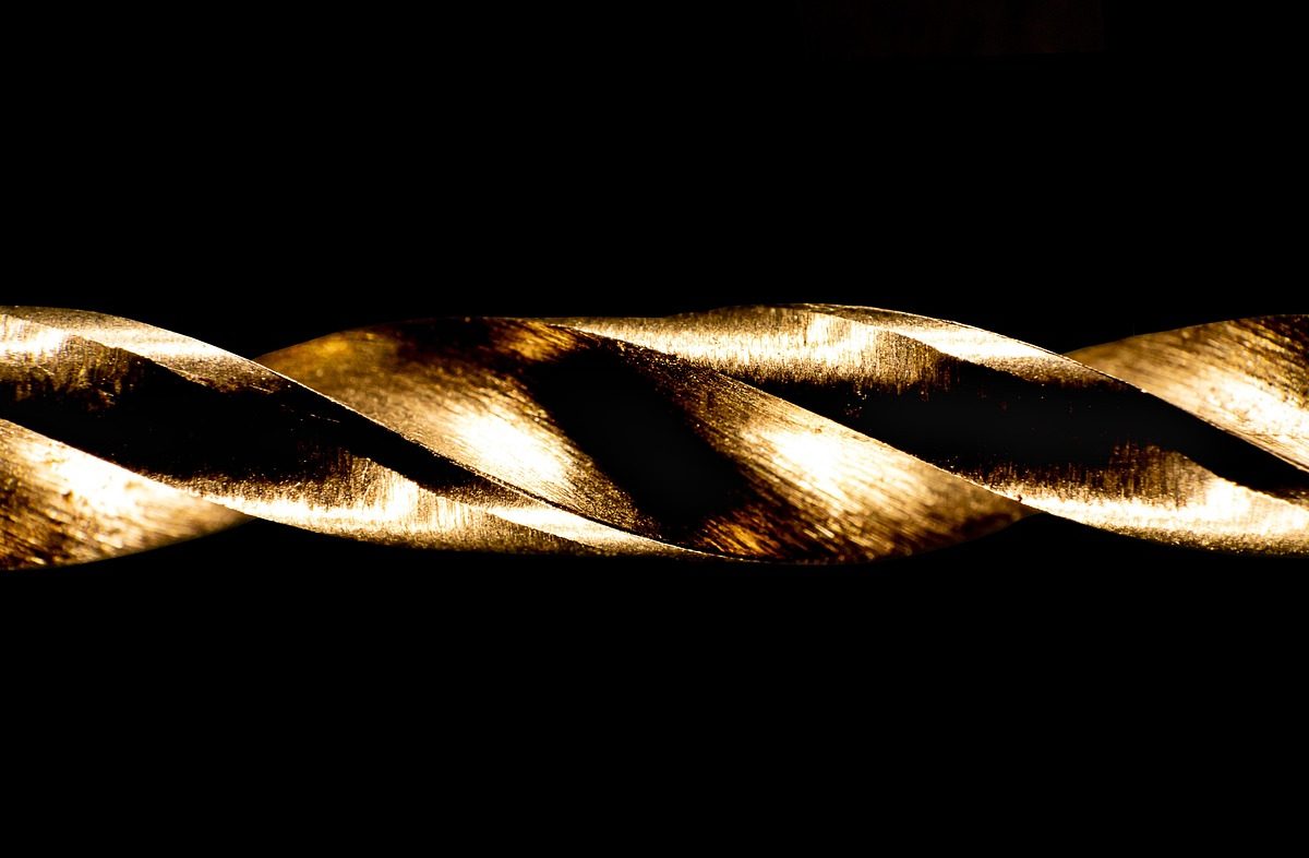 Close-up of a screw and drill bit, the hardware that decides whether a grab bar holds