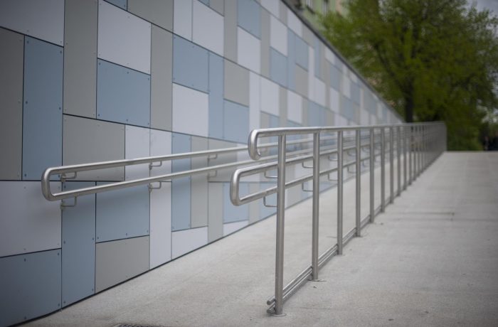 A wheelchair access ramp running up to a building entrance